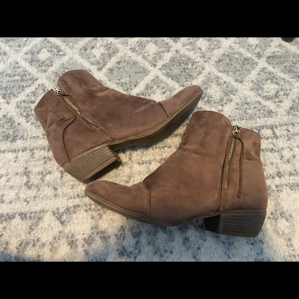 Brown suede booties with gold zipper detail